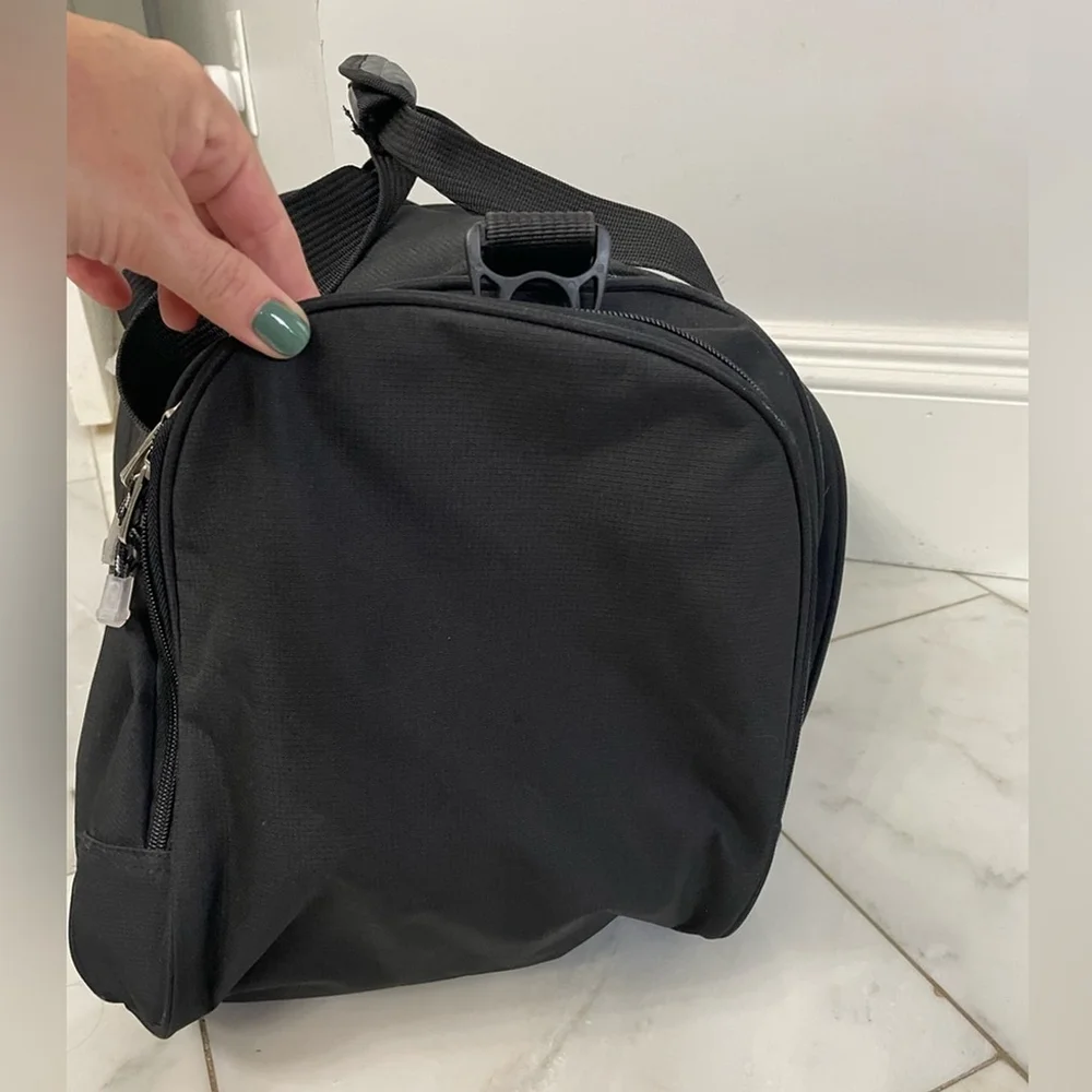 Calpak black canvas multi-pocket dual strap duffel bag travel luggage gym